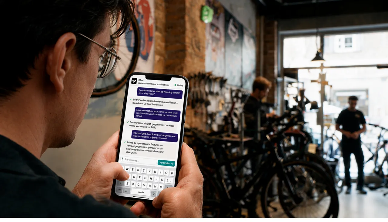 A shop owner talking to Chut from their phone